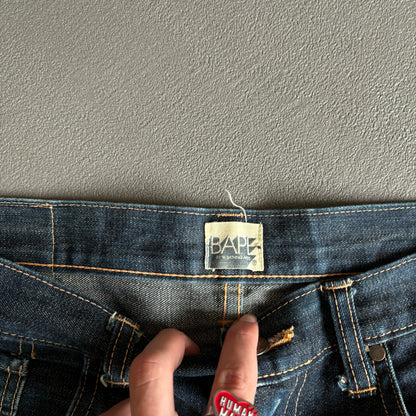 JEANS BAPE ROSSI CON LOGO E TASCA POSTERIORE [W32]